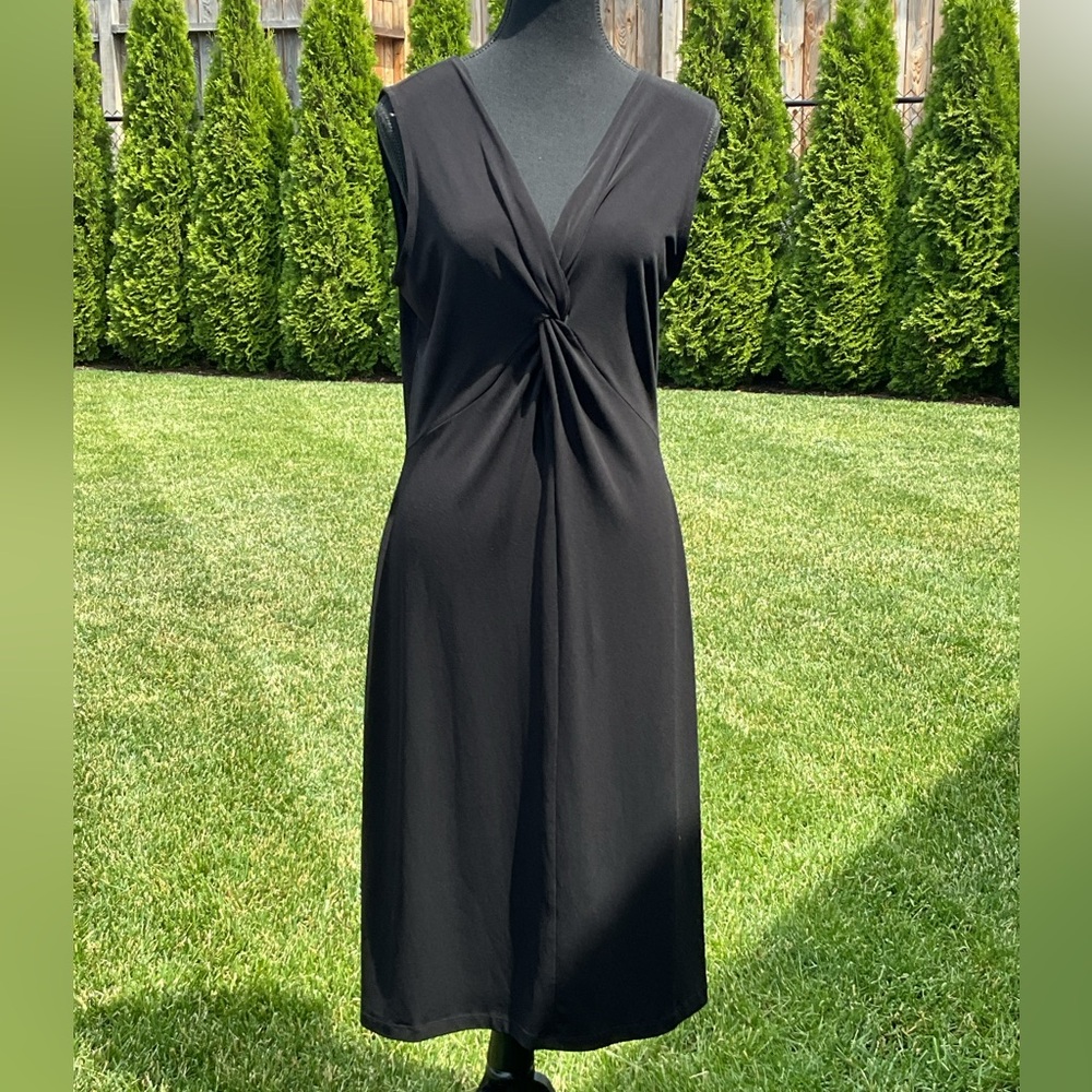 Jacob Deep Black V Neck with Twist in the front.